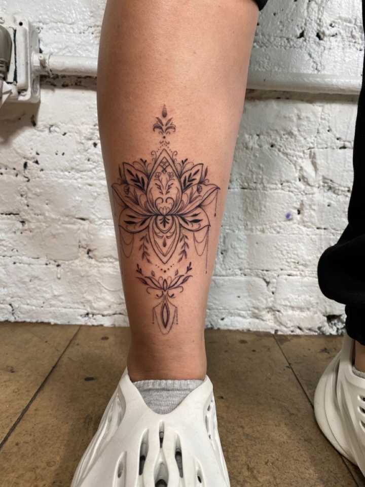 Lotus Mandala Shin Tattoo  Shin tattoo, Flower leg tattoos