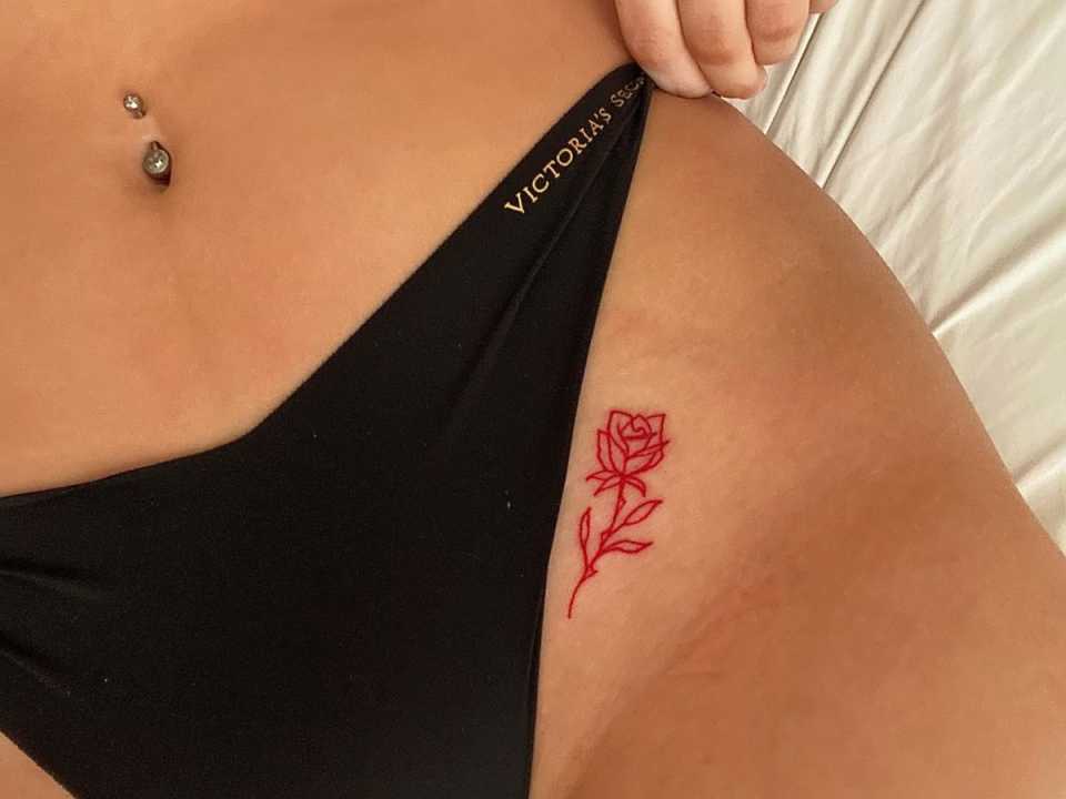 rose tattoo in red ink  Intimate tattoos, Simplistic tattoos