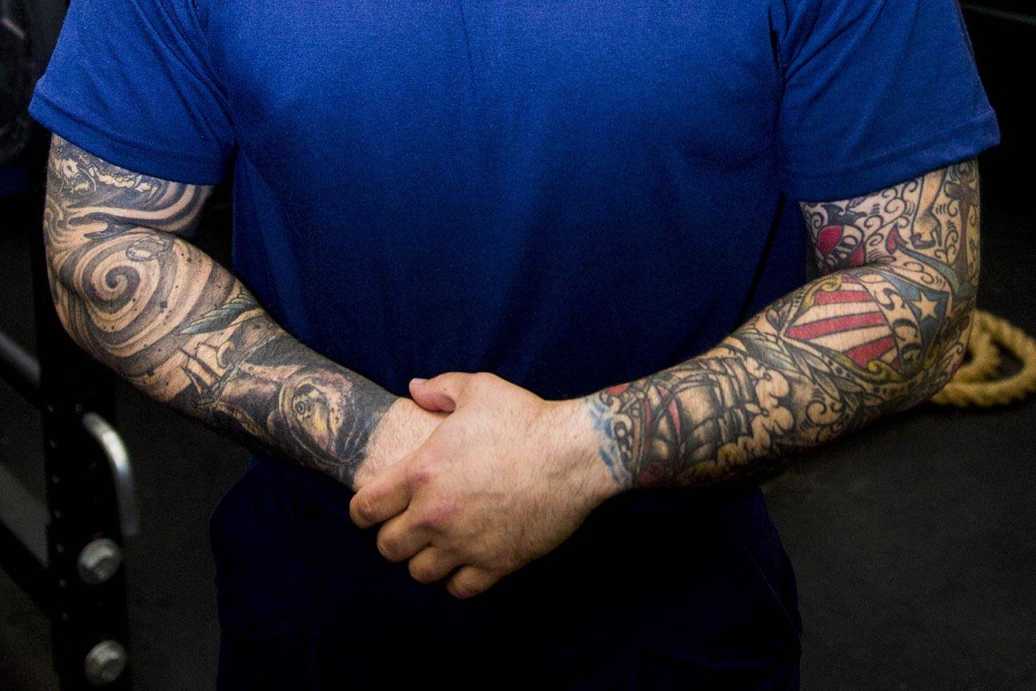 Art on hand: Coast Guard to allow limited hand, finger tattoos