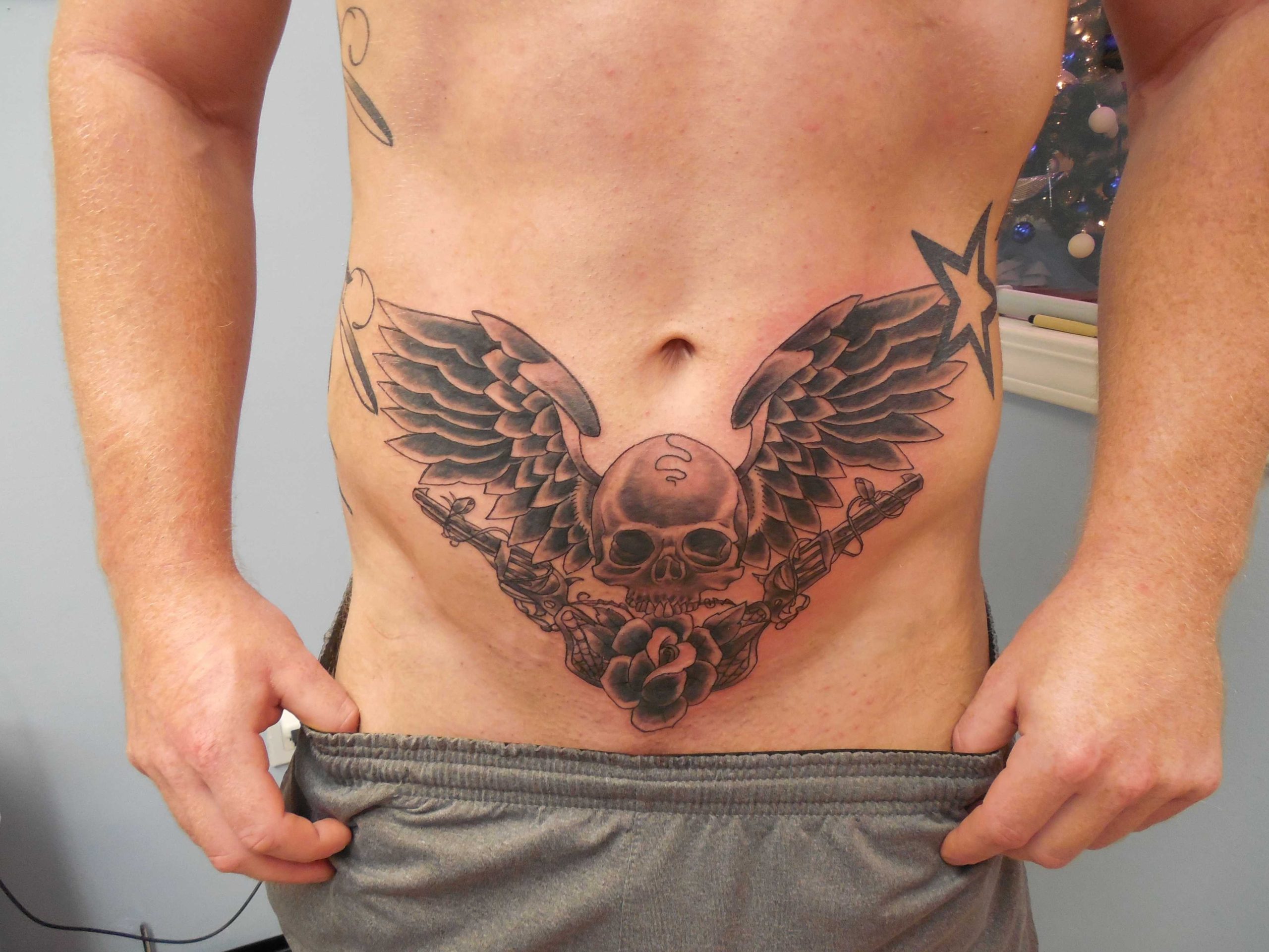 Belly Tattoo For Man  Tattoos for guys, Abdomen tattoo, Lower