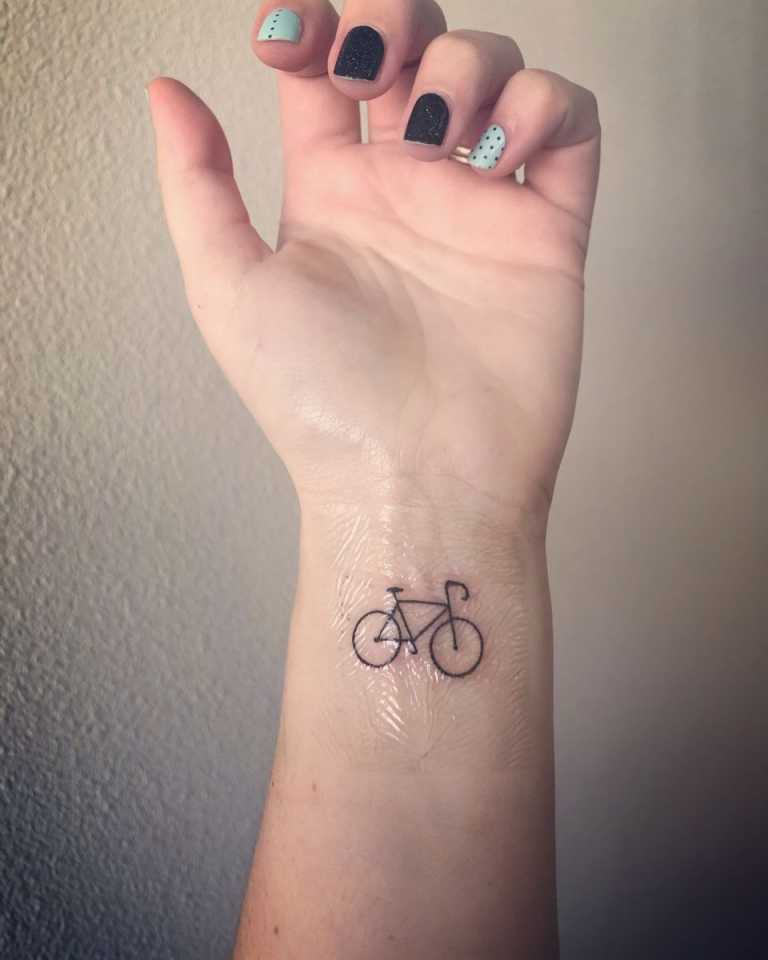 bicycle tattoo. wrist tattoo. small tattoo. tiny tattoo