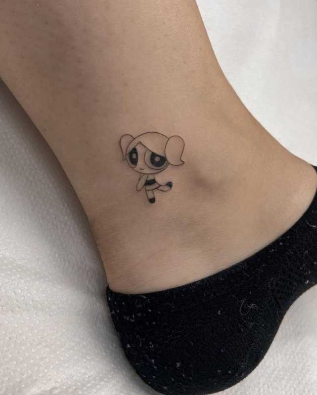 Bubbles from Powerpuff girls tattooed on the ankle.