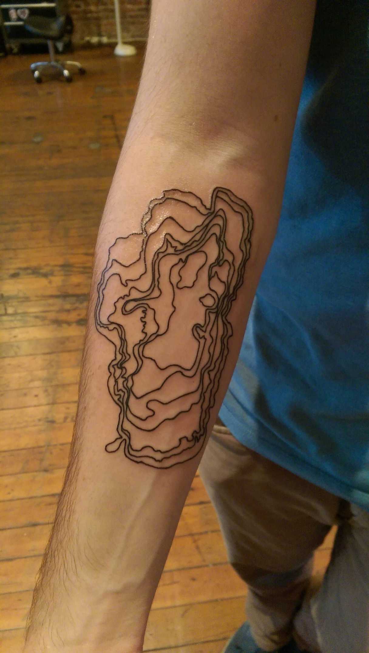 First Tattoo) topographic map of lake Tahoe by Alena Chun at Icon