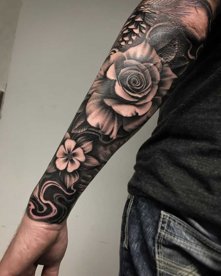 Floral tattoos can also be masculine fellas don