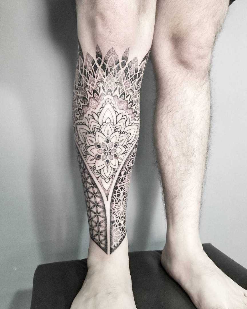 Geometric and mandala piece inked on the right shin  Picture