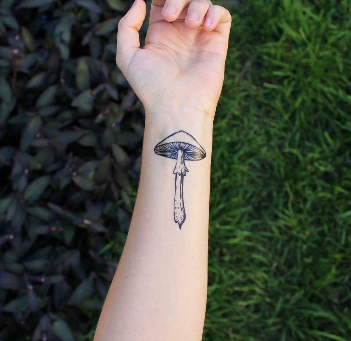Magic mushroom tattoo  Mushroom tattoos, Simple tattoo designs
