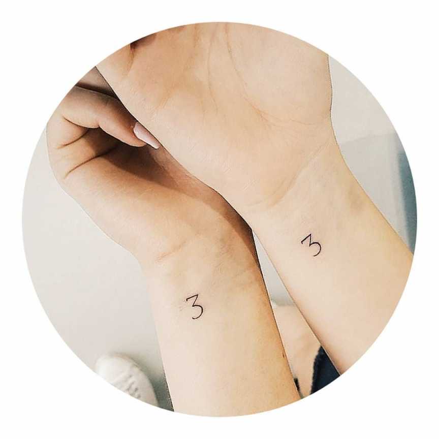 Matching number  friendship tattoos on wrists  Friendship