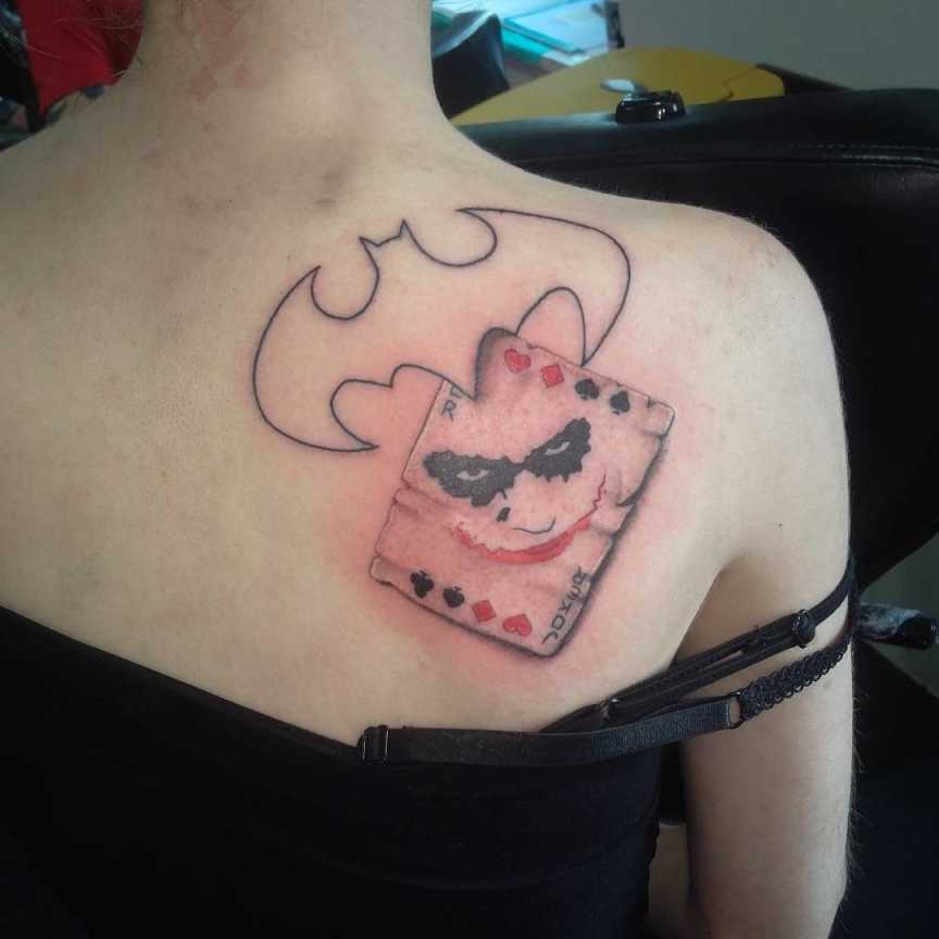 One of the more simple Joker tattoos, the outline of the Bat