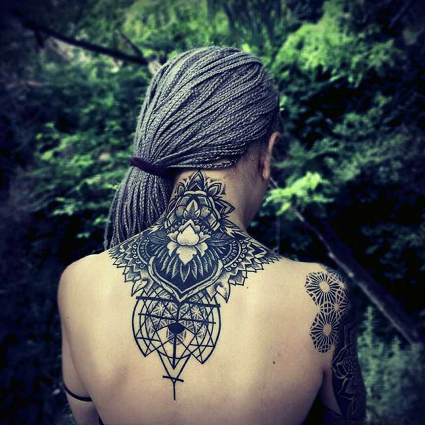 Tattoo uploaded by Orla • Wicked upper back/neck mandela geometric