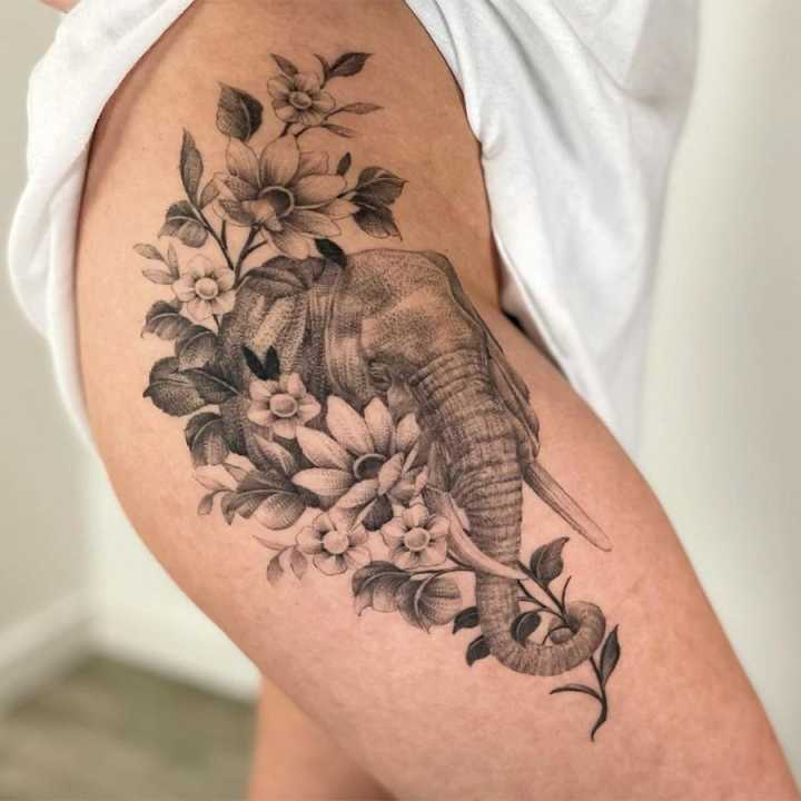Top  Trendy Elephant Flower Tattoo Designs  Inku Paw