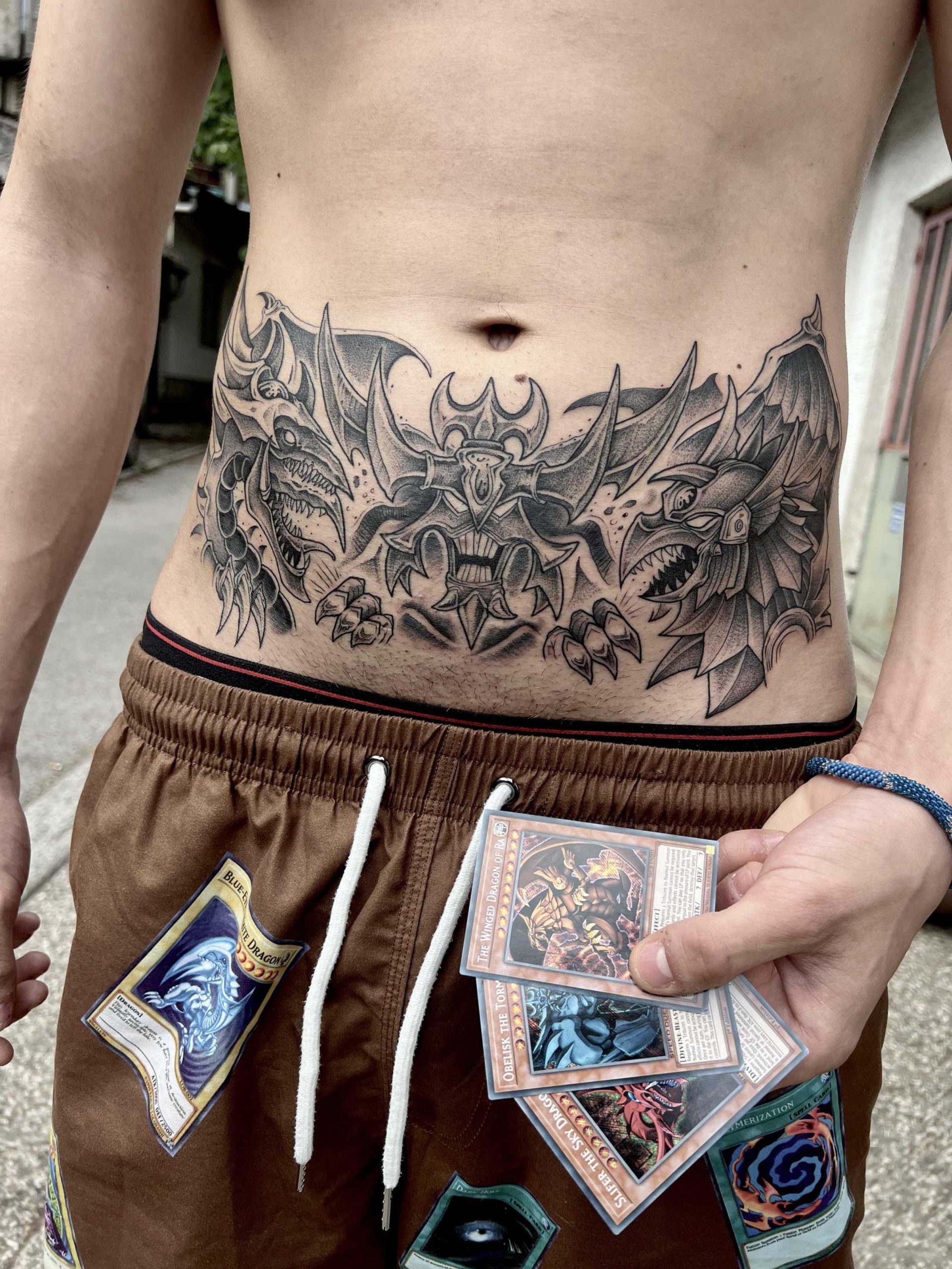 Yu-Gi-Oh stomach tattoo! Done by btcillustration at gentle soul